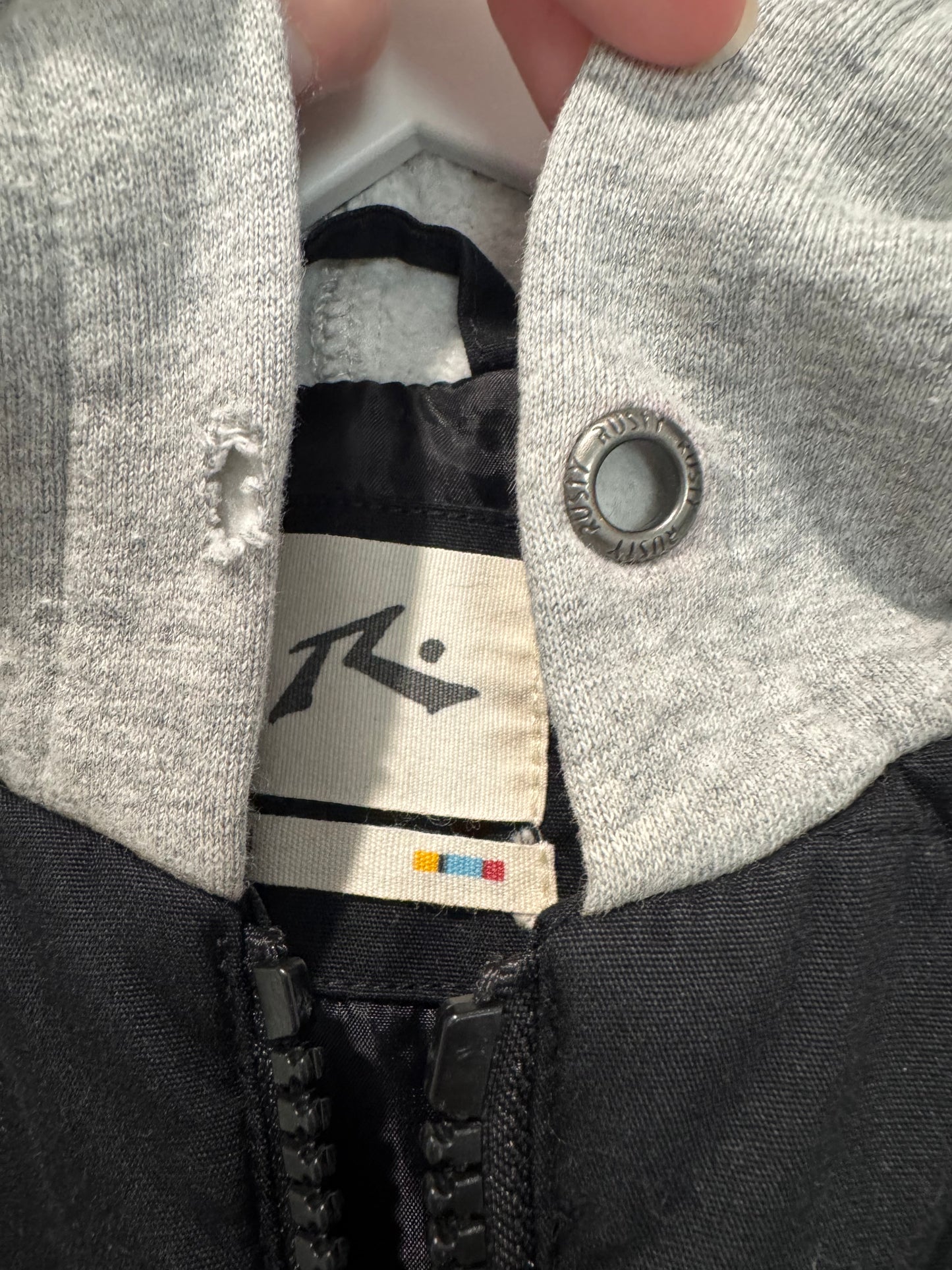 Rusty Boys’ Black Puffer Jacket with Grey Sleeves – Size 4